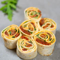 Wrap bites - 8 Stück mit würzigem Hummus und getrockneten Tomaten