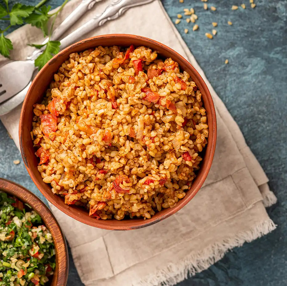 Buffet hot - Bulgur mit gerösteten Zucchini und Paprika Stücken x 12 Portionen