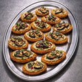 Kartoffelrösti - mit Baba Ganoush und Ruccola befühltes  Kartoffelschiffchen 20 Portionen